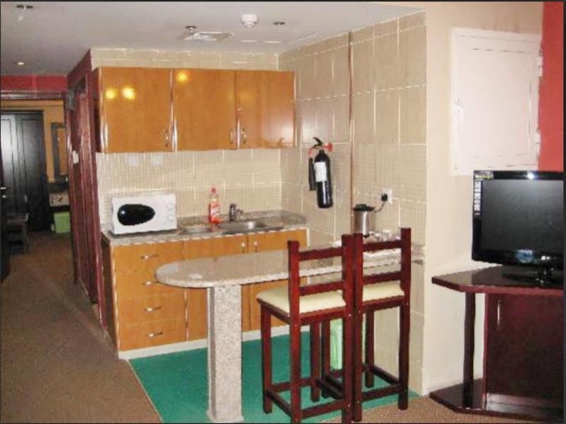 Al Bustan Tower Hotel Suites Sharjah Exterior photo